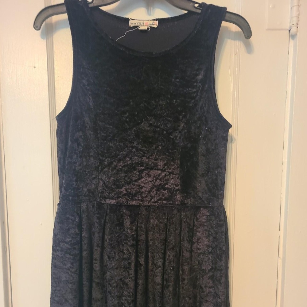 Sarah's Closet black velvet mini dress with a flowy skirt and coquette top